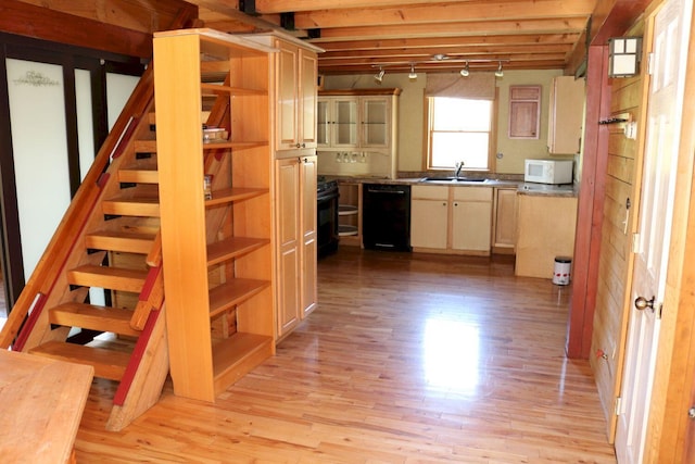 50 Widgeon Rd, Madison, ME 04950 - basement with light wood-type flooring, a sink, and stairs