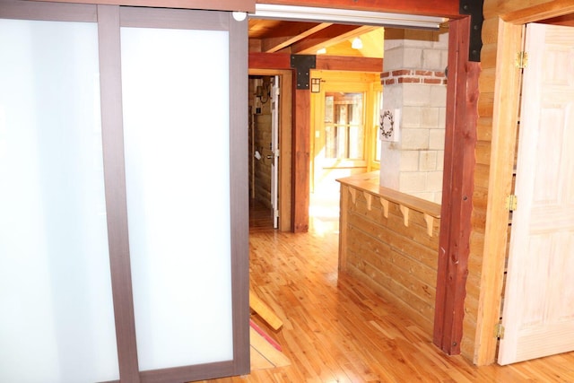 50 Widgeon Rd, Madison, ME 04950 - hallway with beamed ceiling and light wood-style floors