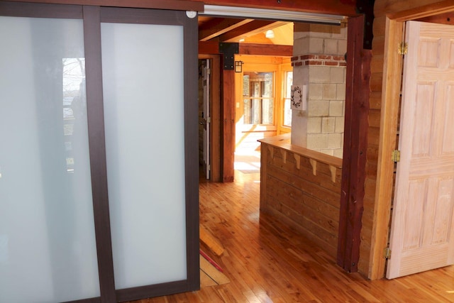 50 Widgeon Rd, Madison, ME 04950 - hall with plenty of natural light and wood finished floors