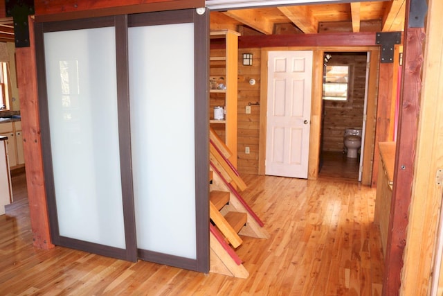 50 Widgeon Rd, Madison, ME 04950 - interior space with light wood-style floors and wood walls