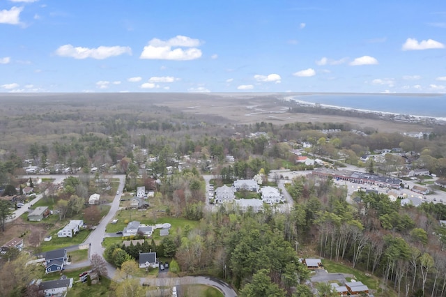 aerial view of property's location with a forest