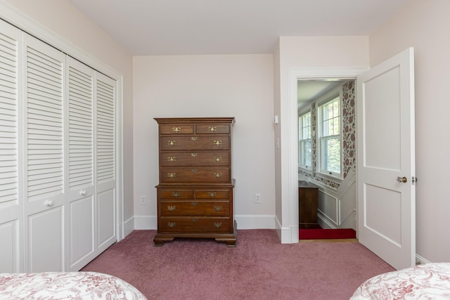 14 Highland St, Portland, ME 04103 - carpeted bedroom with a closet and baseboards