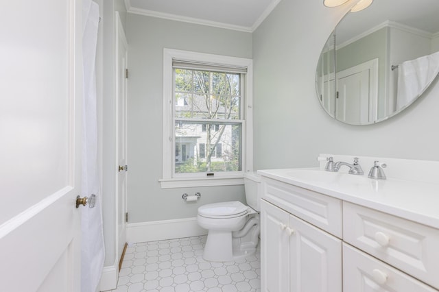 14 Highland St, Portland, ME 04103 - bathroom featuring toilet, vanity, baseboards, and crown molding