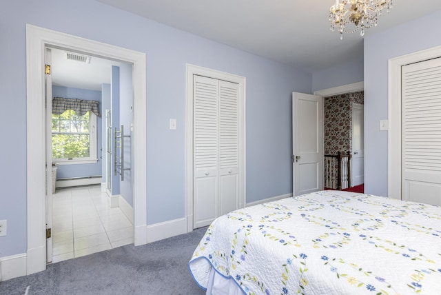14 Highland St, Portland, ME 04103 - bedroom with a baseboard radiator, a chandelier, carpet flooring, tile patterned floors, and baseboards