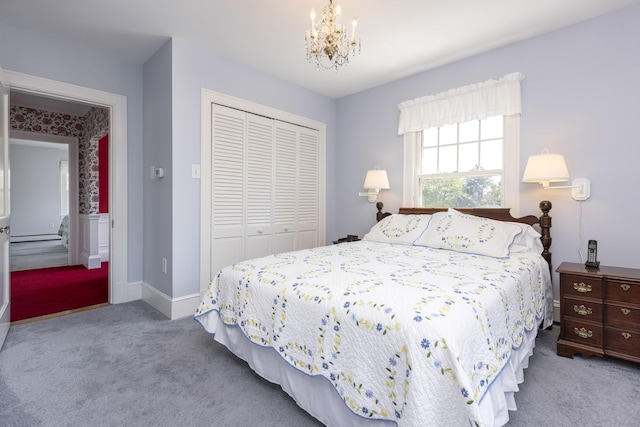 14 Highland St, Portland, ME 04103 - carpeted bedroom featuring a chandelier, a closet, and baseboards