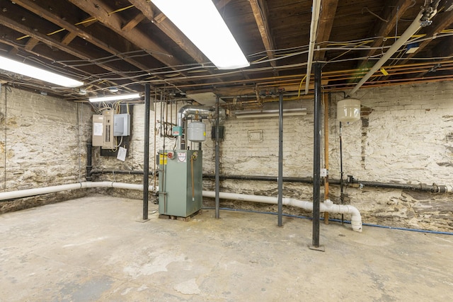 14 Highland St, Portland, ME 04103 - unfinished below grade area with electric panel and a heating unit
