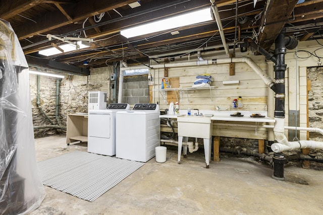 14 Highland St, Portland, ME 04103 - unfinished basement with washer and dryer and a workshop area
