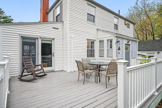 51 Googin St, Lewiston, ME 04240 - wooden terrace with outdoor dining space