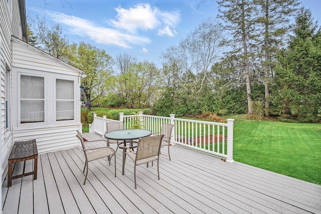 51 Googin St, Lewiston, ME 04240 - wooden terrace with a lawn, view of scattered trees, and outdoor dining area