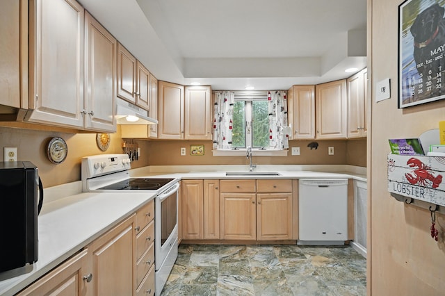 51 Googin St, Lewiston, ME 04240 - kitchen with white appliances, a sink, under cabinet range hood, light countertops, and light brown cabinetry