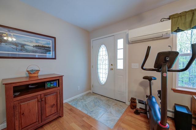 229 Stone Rd, Newfield, ME 04095 - entryway with a wall mounted air conditioner and baseboards