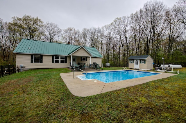 229 Stone Rd, Newfield, ME 04095 - view of swimming pool with an outdoor structure, a shed, and a patio