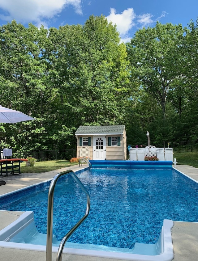 229 Stone Rd, Newfield, ME 04095 - view of pool with fence, an outbuilding, and a patio
