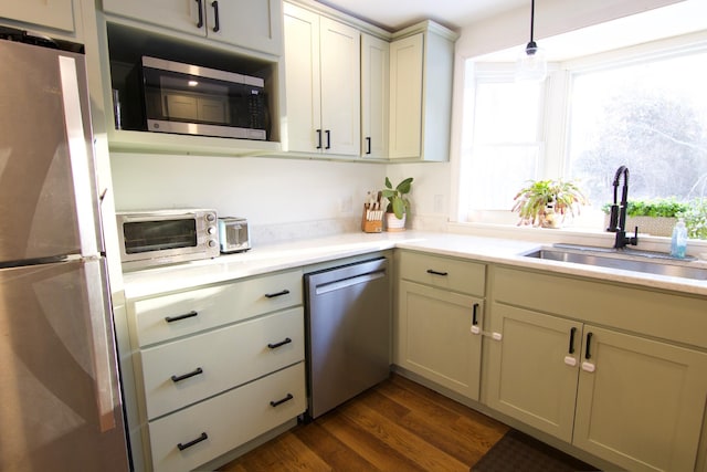 14 Fields Pond Rd, Holden, ME 04429 - kitchen with a sink, a toaster, stainless steel appliances, a wealth of natural light, and light countertops