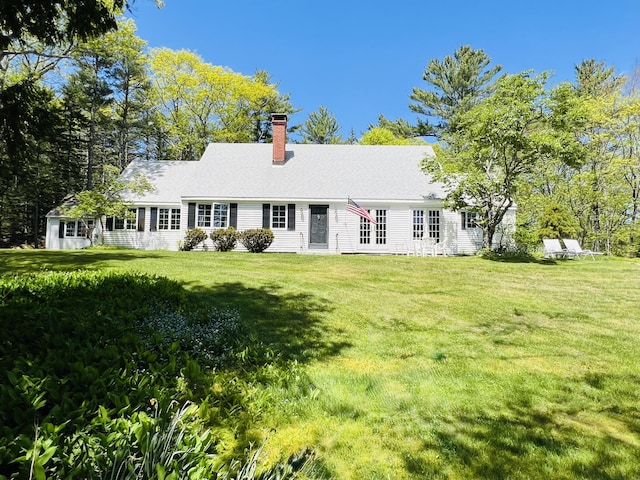 329 Salt Pond Rd, Blue Hill, ME 04614 - view of front of home featuring a chimney and a front yard