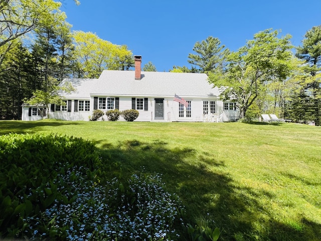 329 Salt Pond Rd, Blue Hill, ME 04614 - back of property with a chimney, a yard, and french doors