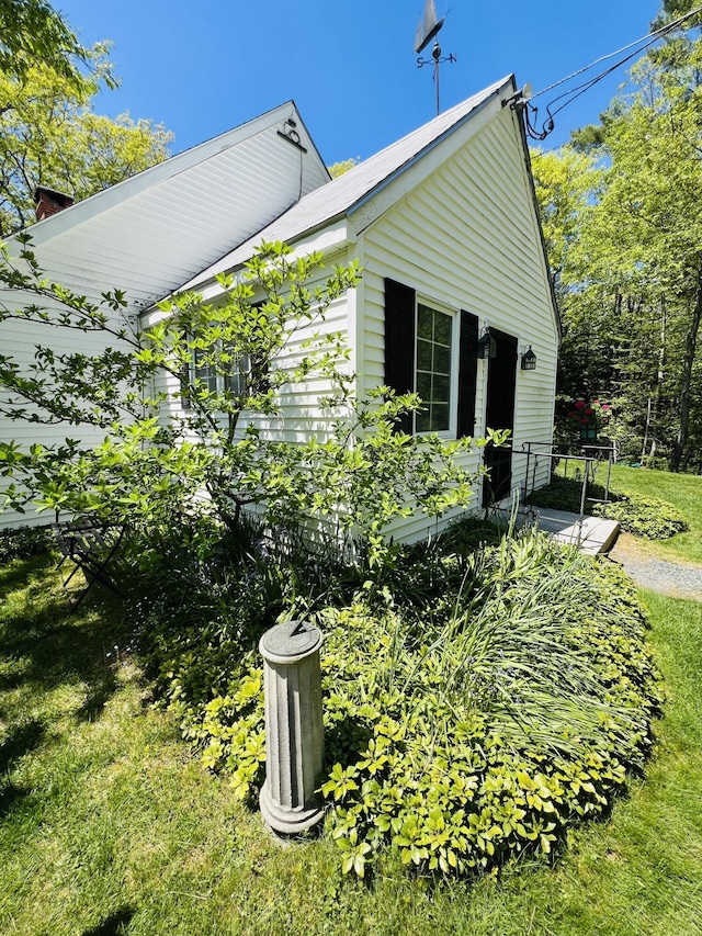 329 Salt Pond Rd, Blue Hill, ME 04614 - view of side of property featuring a lawn
