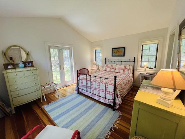 329 Salt Pond Rd, Blue Hill, ME 04614 - bedroom with dark wood-style floors, multiple windows, lofted ceiling, and french doors
