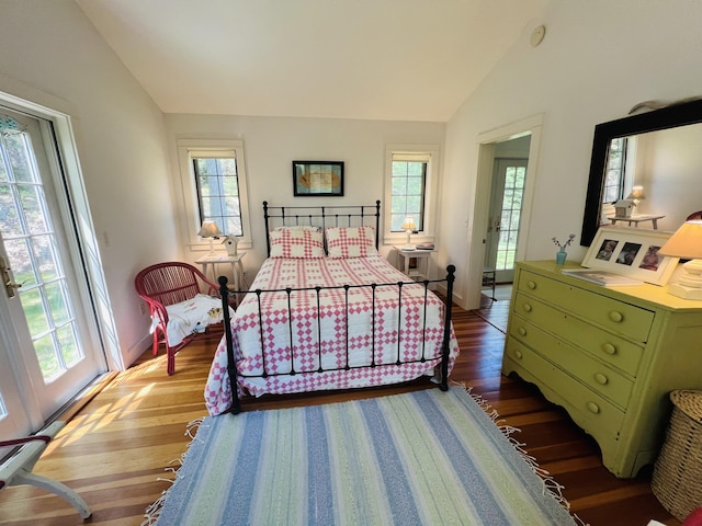 329 Salt Pond Rd, Blue Hill, ME 04614 - bedroom featuring vaulted ceiling, wood finished floors, multiple windows, and baseboards