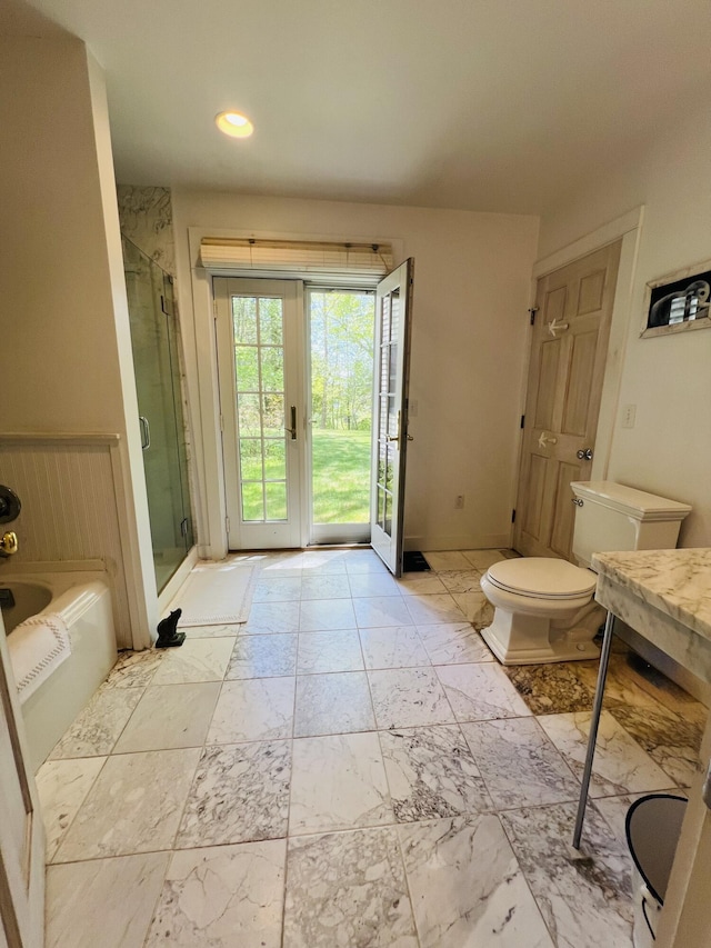 329 Salt Pond Rd, Blue Hill, ME 04614 - bathroom featuring a garden tub, a shower stall, toilet, recessed lighting, and vanity