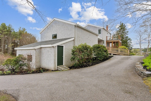 388 High Head Rd, Harpswell, ME 04079 - view of side of property featuring entry steps, driveway, and a balcony