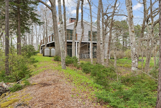 388 High Head Rd, Harpswell, ME 04079 - view of side of home featuring a chimney and a deck