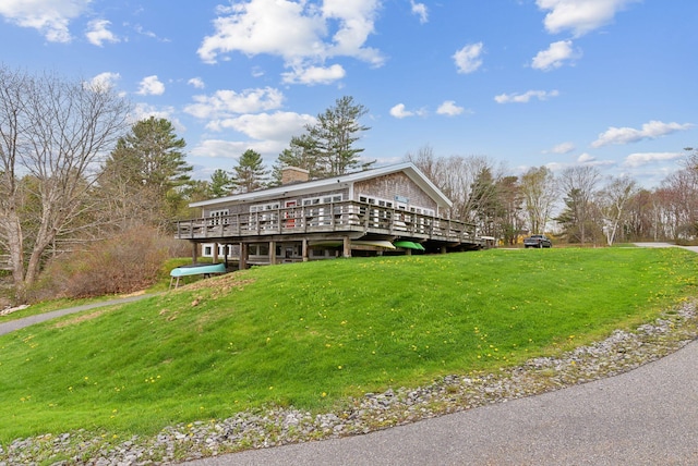 388 High Head Rd, Harpswell, ME 04079 - rear view of property featuring a lawn, a deck, and a chimney