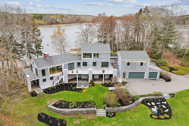 388 High Head Rd, Harpswell, ME 04079 - back of house featuring stairs, a chimney, a lawn, and a garage