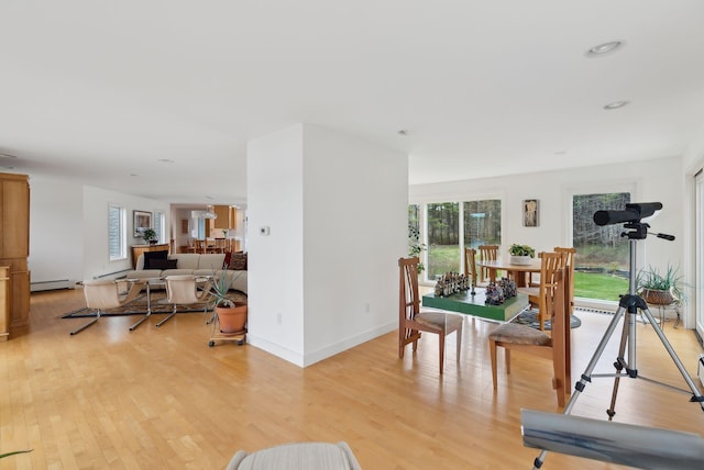 388 High Head Rd, Harpswell, ME 04079 - rec room with light wood-type flooring, a baseboard radiator, and recessed lighting