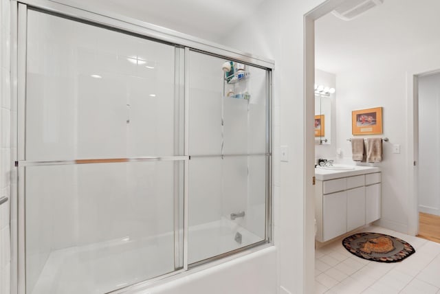388 High Head Rd, Harpswell, ME 04079 - bathroom with vanity, enclosed tub / shower combo, tile patterned floors, and baseboards