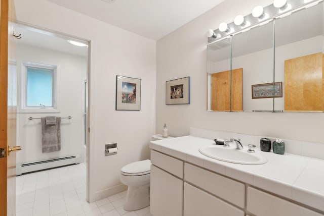 388 High Head Rd, Harpswell, ME 04079 - bathroom with a baseboard radiator, toilet, vanity, and tile patterned floors