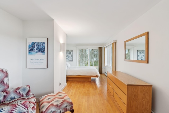 388 High Head Rd, Harpswell, ME 04079 - bedroom with light wood finished floors and a baseboard radiator