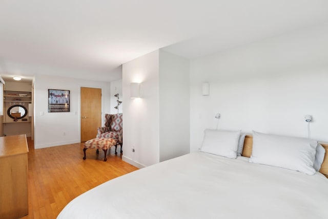 388 High Head Rd, Harpswell, ME 04079 - bedroom featuring light wood-style floors and baseboards