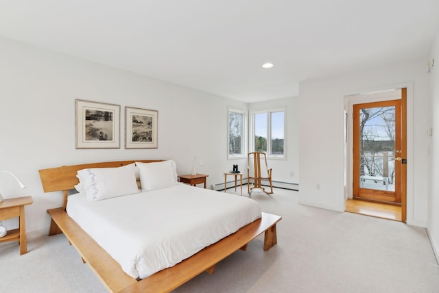 388 High Head Rd, Harpswell, ME 04079 - bedroom featuring light carpet, multiple windows, recessed lighting, baseboards, and a baseboard radiator