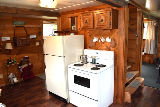 1352 Main Rd, Carroll Plt, ME 04487 - kitchen featuring white appliances, brown cabinetry, wooden walls, and dark wood-type flooring
