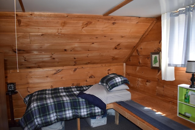 1352 Main Rd, Carroll Plt, ME 04487 - bedroom with wood walls and vaulted ceiling