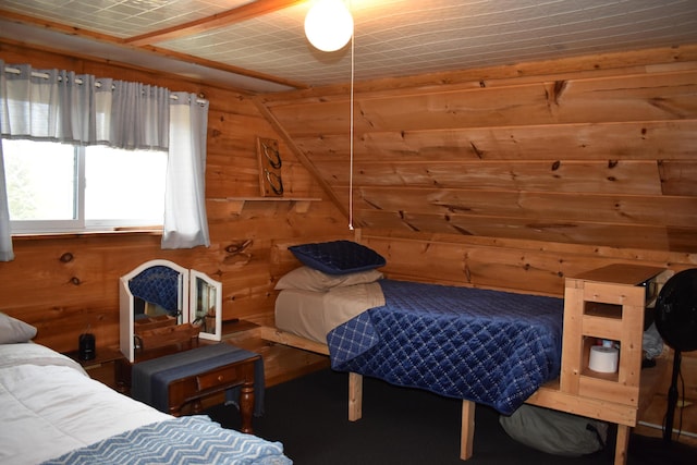 1352 Main Rd, Carroll Plt, ME 04487 - bedroom with wood walls