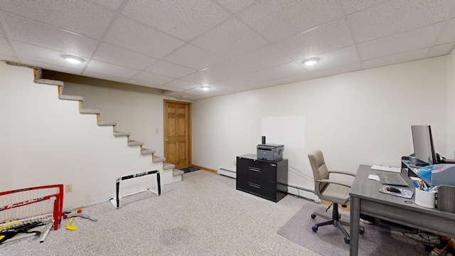 home office with carpet, baseboard heating, and a paneled ceiling