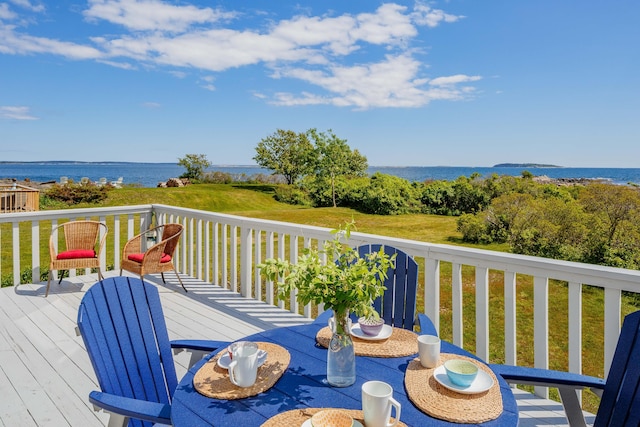 20 Long Point Is, Harpswell, ME 04079 - wooden terrace featuring outdoor dining area, a water view, and a lawn