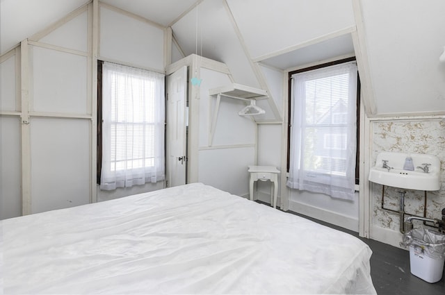 bedroom with wood finished floors