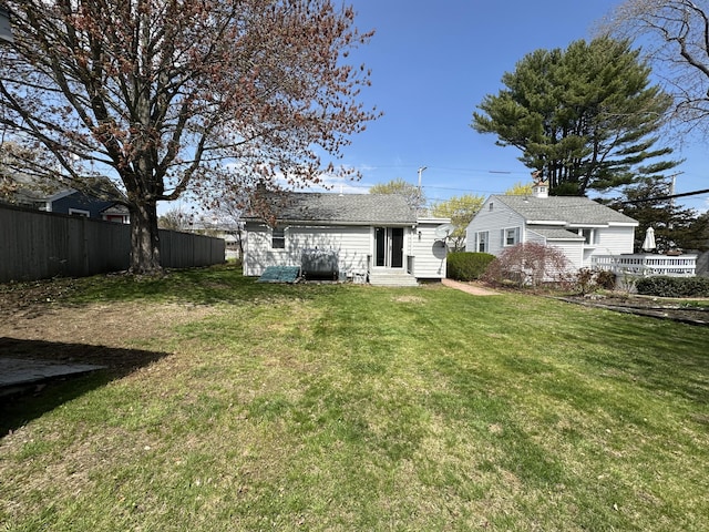 back of property featuring entry steps