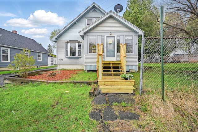 back of house featuring entry steps