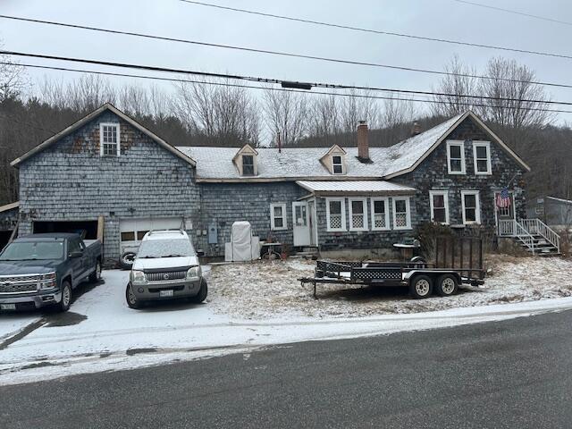 217 Dickvale Rd, Peru, ME 04290 - view of front of property with a chimney and concrete driveway