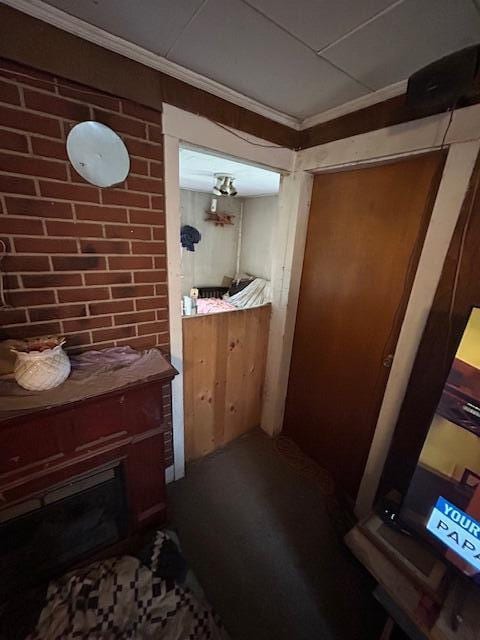 217 Dickvale Rd, Peru, ME 04290 - bathroom with ornamental molding and brick wall