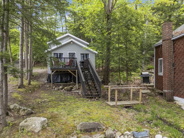 23 E Shore Dr, Greene, ME 04236 - back of property featuring a deck and stairway