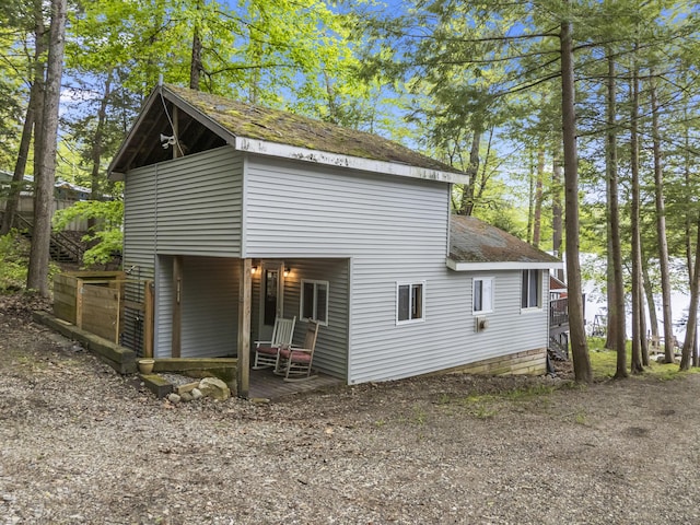 23 E Shore Dr, Greene, ME 04236 - view of home's exterior with roof with shingles