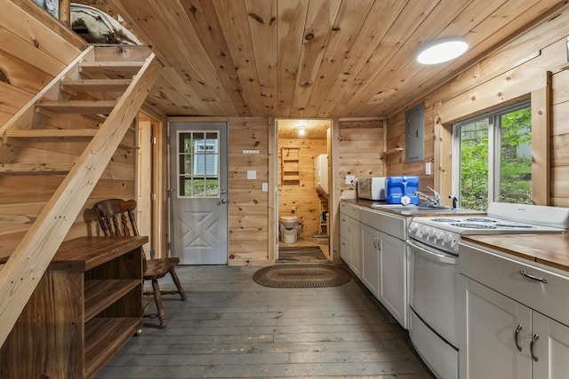23 E Shore Dr, Greene, ME 04236 - kitchen with white appliances, wood ceiling, hardwood / wood-style flooring, wood walls, and white cabinetry