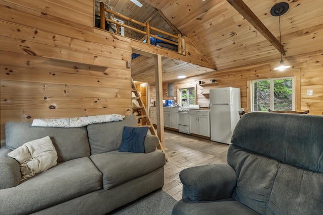 23 E Shore Dr, Greene, ME 04236 - living area with wooden ceiling, light wood-style floors, wooden walls, stairway, and high vaulted ceiling