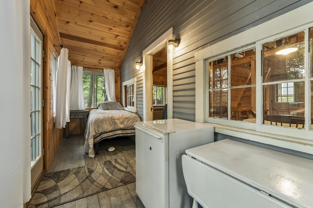 23 E Shore Dr, Greene, ME 04236 - bedroom featuring hardwood / wood-style flooring, vaulted ceiling, wood ceiling, and wooden walls