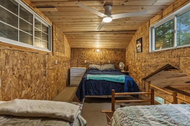 23 E Shore Dr, Greene, ME 04236 - bedroom featuring wooden ceiling and concrete flooring